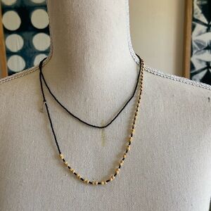 Artisan handmade bead necklace black and beige